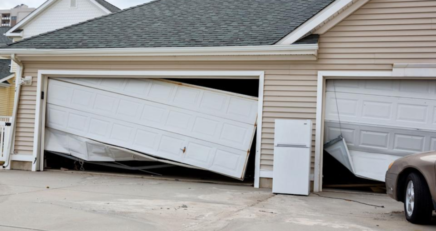 Damaged residential garage with collapsed doors prepared for professional garage demolition services in New Jersey