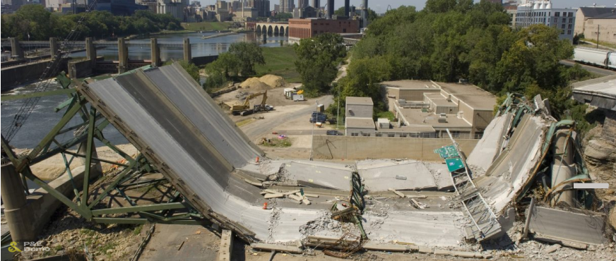 Collapsed concrete and steel bridge with debris scattered during professional bridge demolition and emergency response services in New Jersey